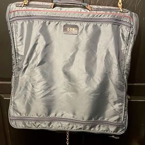 delsey folding garment bag with 4 built in hangers and shoulder strap carrying